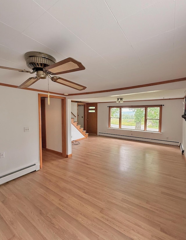 1190 Indian River Rd, Addison, ME 04606 - unfurnished living room featuring a ceiling fan, stairway, light wood-type flooring, and a baseboard heating unit