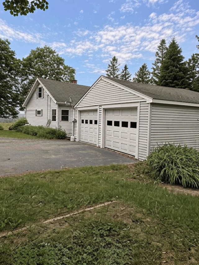 1190 Indian River Rd, Addison, ME 04606 - garage with asphalt driveway