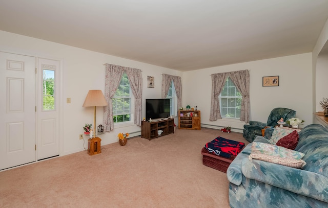 119 Somersworth Rd, North Berwick, ME 03906 - carpeted living room featuring a baseboard heating unit