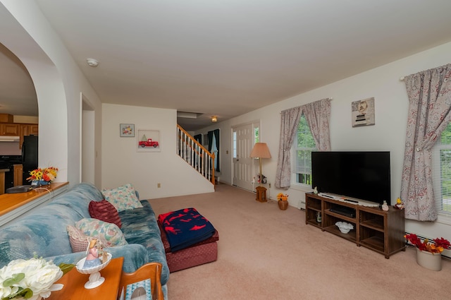 119 Somersworth Rd, North Berwick, ME 03906 - living room with carpet, stairs, and arched walkways