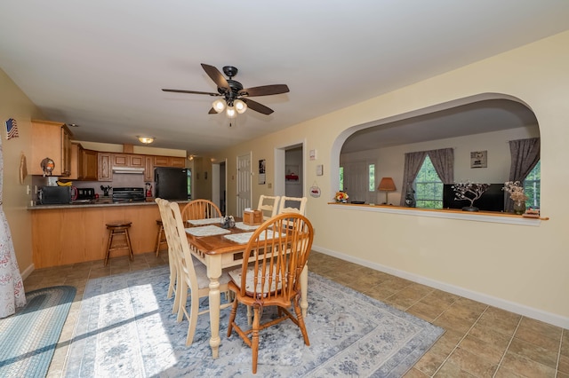 119 Somersworth Rd, North Berwick, ME 03906 - dining area with ceiling fan and light tile patterned floors