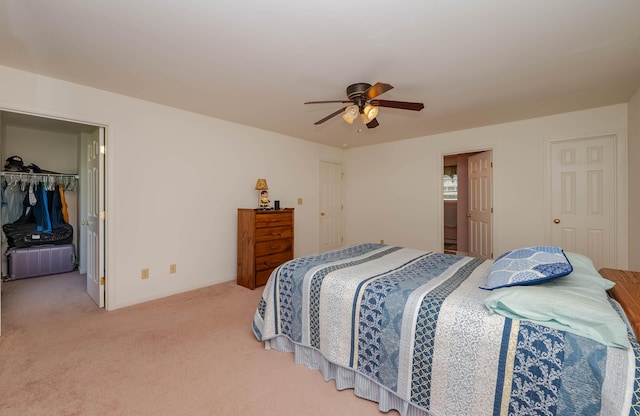 119 Somersworth Rd, North Berwick, ME 03906 - bedroom featuring a closet, light carpet, a spacious closet, and ceiling fan