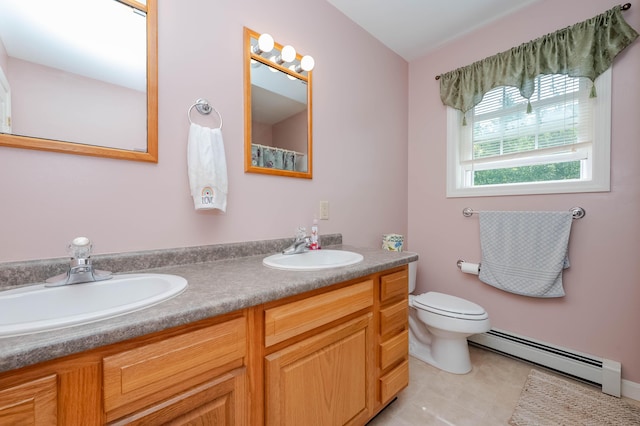 119 Somersworth Rd, North Berwick, ME 03906 - bathroom featuring a baseboard heating unit, double vanity, tile patterned flooring, and curtained shower