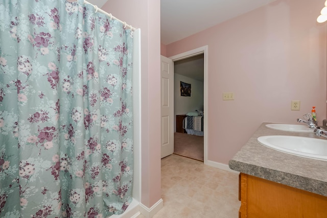 119 Somersworth Rd, North Berwick, ME 03906 - full bathroom with double vanity and a shower with curtain