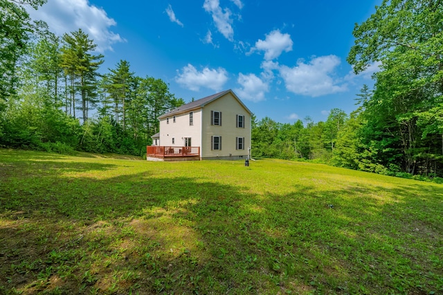 119 Somersworth Rd, North Berwick, ME 03906 - rear view of house with a deck, a yard, and a forest view