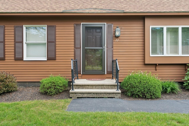 11 Concord Pl Unit 21, Auburn, ME 04210 - doorway to property featuring roof with shingles