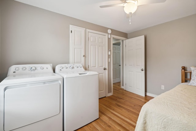 11 Concord Pl Unit 21, Auburn, ME 04210 - washroom featuring independent washer and dryer, light wood-style floors, and ceiling fan