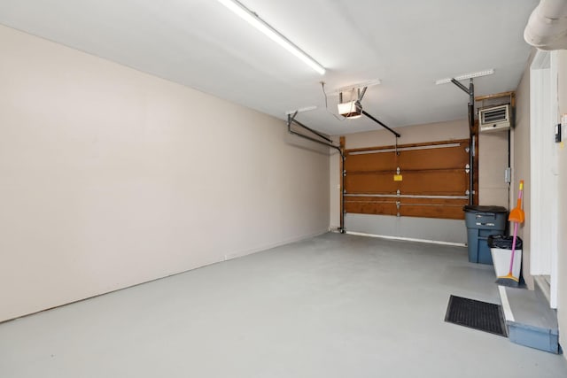 11 Concord Pl Unit 21, Auburn, ME 04210 - garage featuring a garage door opener
