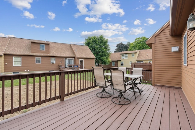 11 Concord Pl Unit 21, Auburn, ME 04210 - wooden terrace featuring outdoor dining space and a residential view