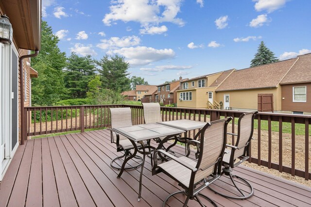 11 Concord Pl Unit 21, Auburn, ME 04210 - wooden terrace with a residential view and outdoor dining area