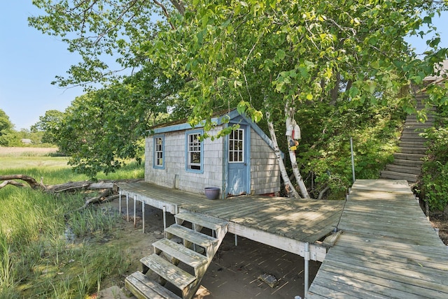 3 Tidewater Cv, Falmouth, ME 04105 - deck featuring stairs and an outdoor structure