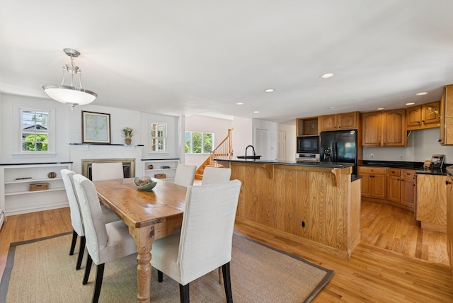 3 Tidewater Cv, Falmouth, ME 04105 - dining room featuring plenty of natural light, light wood-type flooring, recessed lighting, and stairs