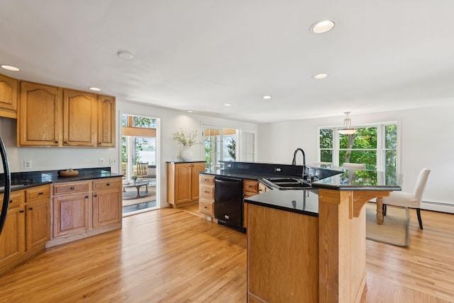 3 Tidewater Cv, Falmouth, ME 04105 - kitchen featuring dishwasher, light wood-type flooring, a breakfast bar, dark countertops, and recessed lighting