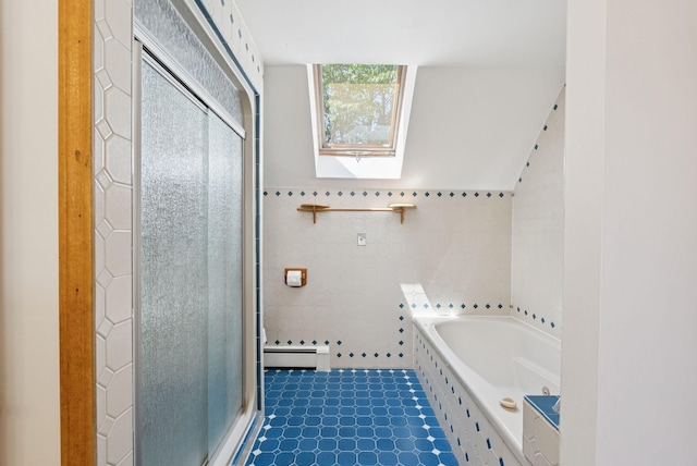 3 Tidewater Cv, Falmouth, ME 04105 - bathroom featuring a skylight, tile walls, a shower stall, a bath, and a baseboard radiator