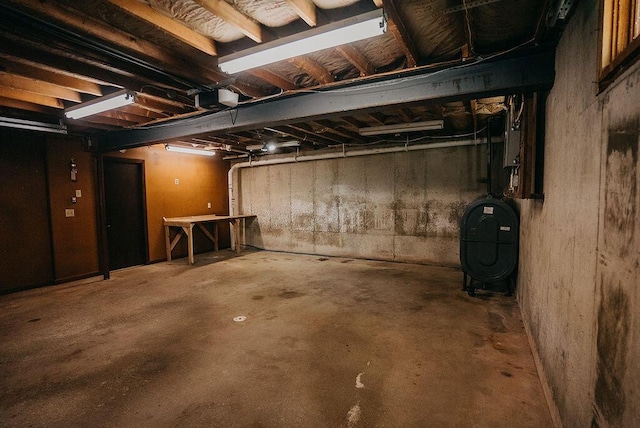 41 Curtis Ln, Milford, ME 04461 - unfinished basement with oil tank
