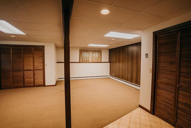 41 Curtis Ln, Milford, ME 04461 - finished basement featuring carpet floors, baseboard heating, a drop ceiling, recessed lighting, and a baseboard heating unit