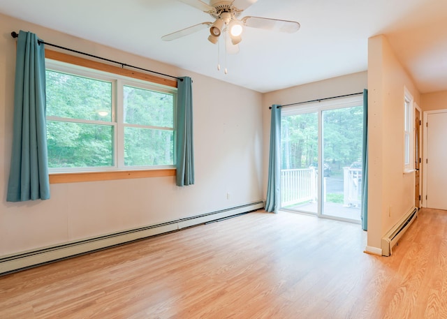 919 College St, Lewiston, ME 04240 - spare room with a baseboard heating unit, a baseboard radiator, light wood-type flooring, and ceiling fan