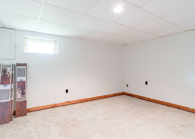 919 College St, Lewiston, ME 04240 - basement with a drop ceiling and baseboards