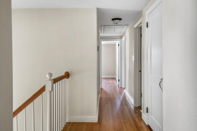 24 Littlejohn Rd, Cape Elizabeth, ME 04107 - hall featuring attic access, wood finished floors, and an upstairs landing