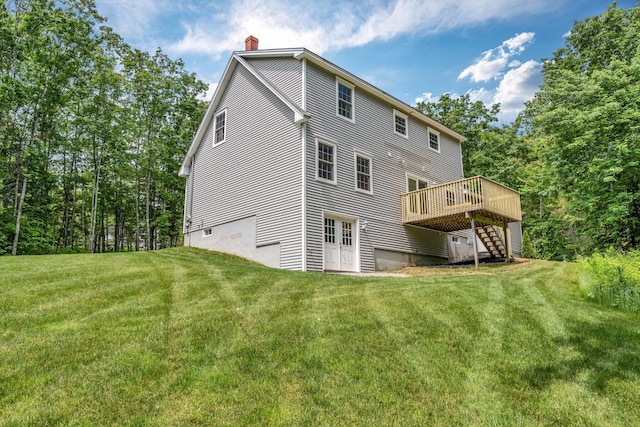 31 Pond Ridge Dr, Lewiston, ME 04240 - back of house featuring a chimney, stairs, a wooden deck, and a yard