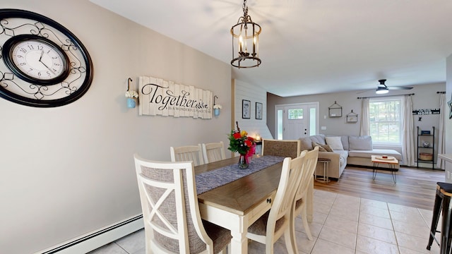31 Pond Ridge Dr, Lewiston, ME 04240 - dining space with baseboard heating, light tile patterned floors, and a ceiling fan