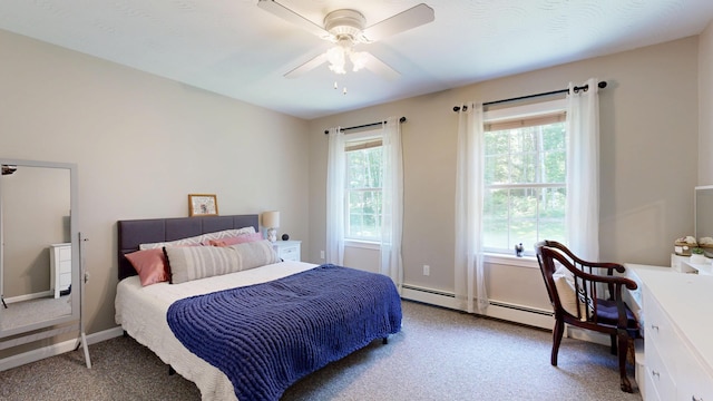 31 Pond Ridge Dr, Lewiston, ME 04240 - bedroom featuring a baseboard heating unit, carpet flooring, a desk, and ceiling fan