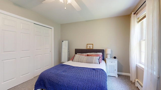 31 Pond Ridge Dr, Lewiston, ME 04240 - bedroom featuring a baseboard heating unit, carpet floors, multiple windows, and ceiling fan