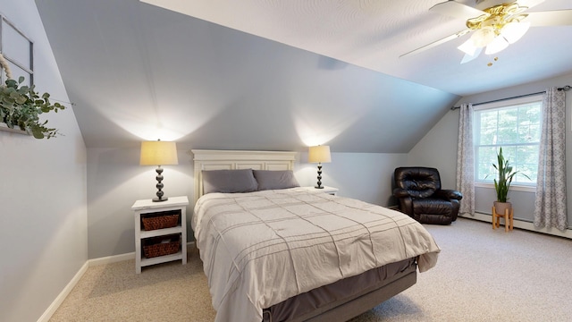 31 Pond Ridge Dr, Lewiston, ME 04240 - bedroom with light colored carpet, vaulted ceiling, ceiling fan, and a baseboard heating unit