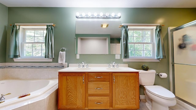 31 Pond Ridge Dr, Lewiston, ME 04240 - bathroom featuring a stall shower, a garden tub, double vanity, and tile patterned floors