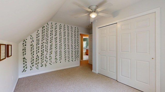 31 Pond Ridge Dr, Lewiston, ME 04240 - unfurnished bedroom with lofted ceiling, light colored carpet, a closet, and a ceiling fan
