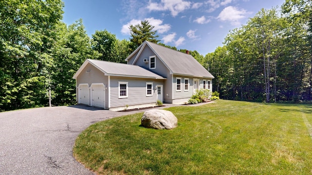 31 Pond Ridge Dr, Lewiston, ME 04240 - view of front of home with a front yard and a chimney
