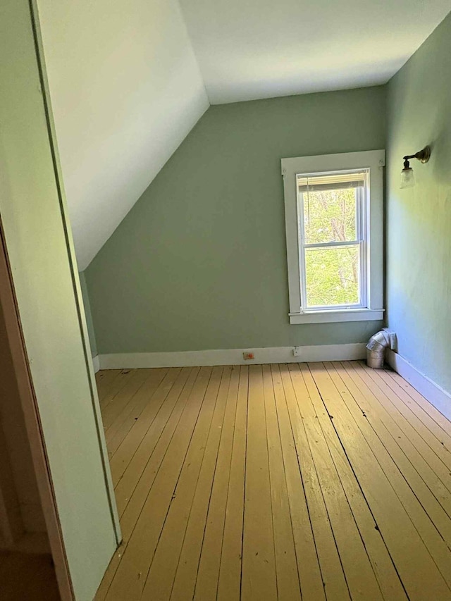 18 Clark St, Calais, ME 04619 - additional living space with wood-type flooring and vaulted ceiling