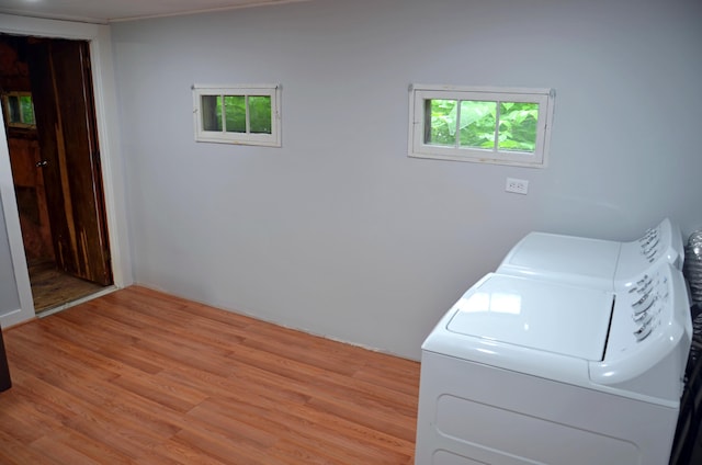 10 Stevens St, Norway, ME 04268 - laundry room with light wood-style floors and washing machine and clothes dryer