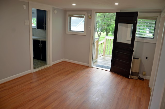 10 Stevens St, Norway, ME 04268 - entrance foyer with light wood-style floors, recessed lighting, and ornamental molding