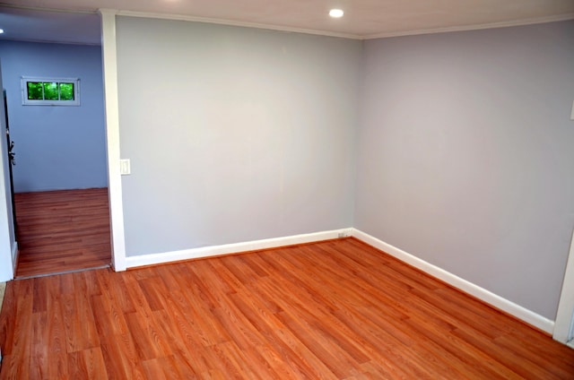 10 Stevens St, Norway, ME 04268 - unfurnished room featuring recessed lighting, light wood-type flooring, and crown molding