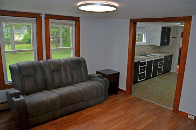 10 Stevens St, Norway, ME 04268 - living area featuring wood finished floors and baseboards