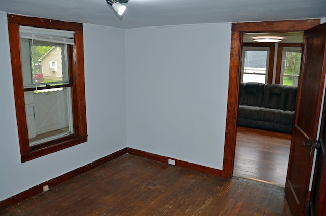 10 Stevens St, Norway, ME 04268 - unfurnished room with hardwood / wood-style flooring and baseboards