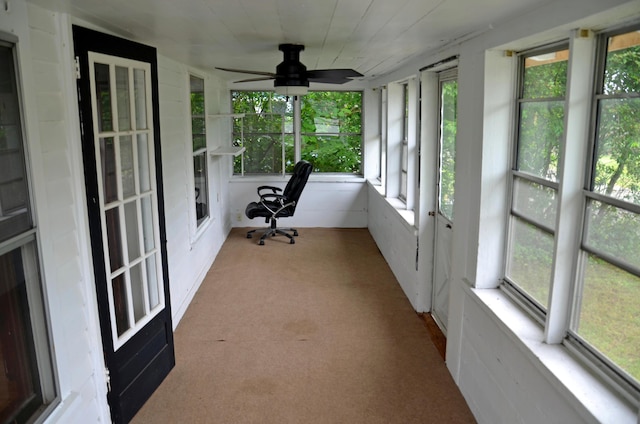 10 Stevens St, Norway, ME 04268 - unfurnished sunroom with carpet flooring and a ceiling fan