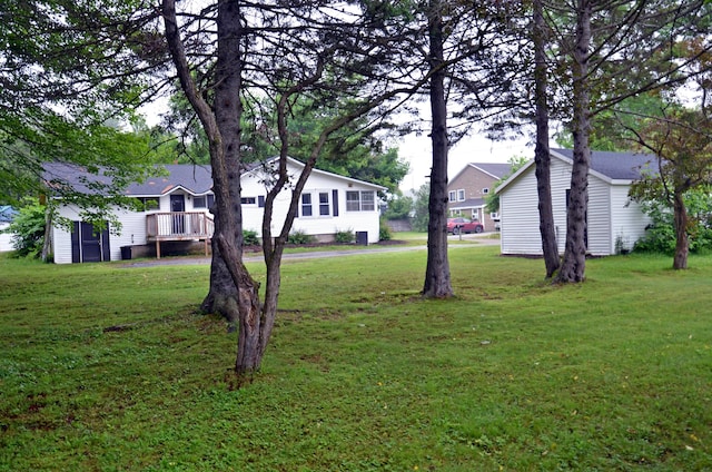 10 Stevens St, Norway, ME 04268 - view of grassy yard with a wooden deck