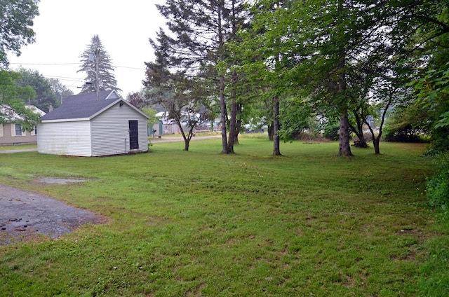 10 Stevens St, Norway, ME 04268 - view of grassy yard with an outbuilding