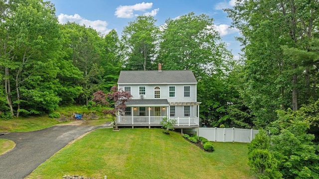 19 Fox Run Rd, Gray, ME 04039 - view of front facade with a deck, a chimney, asphalt driveway, and a gate