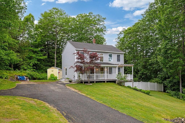 19 Fox Run Rd, Gray, ME 04039 - colonial home with a storage unit, a pergola, a chimney, a wooden deck, and a shingled roof