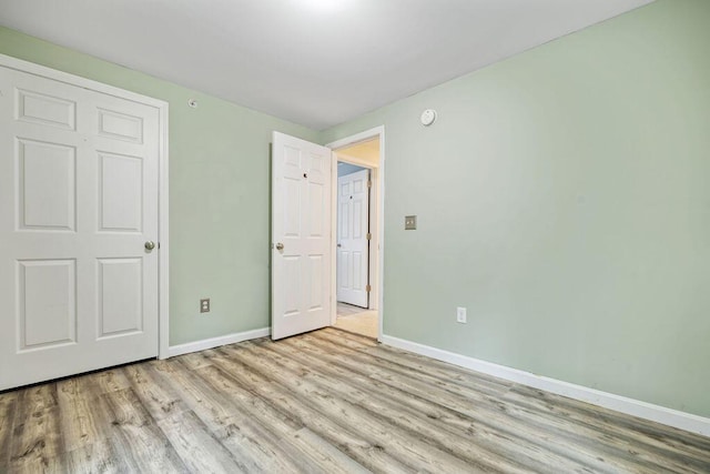 19 Fox Run Rd, Gray, ME 04039 - unfurnished bedroom featuring wood finished floors and baseboards