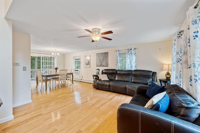 19 Fox Run Rd, Gray, ME 04039 - living area featuring a ceiling fan, a chandelier, light wood-style flooring, and a baseboard heating unit