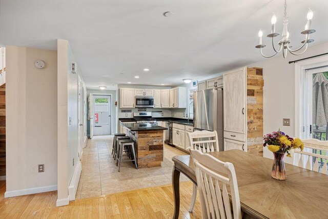 19 Fox Run Rd, Gray, ME 04039 - dining room featuring a chandelier, light wood-type flooring, and recessed lighting