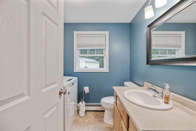 19 Fox Run Rd, Gray, ME 04039 - half bath featuring washer and dryer, vanity, tile patterned floors, and baseboard heating