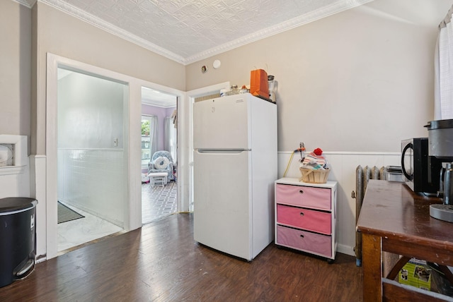 93 Chapel St, South Portland, ME 04106 - kitchen with freestanding refrigerator, ornamental molding, dark wood finished floors, a wainscoted wall, and an ornate ceiling