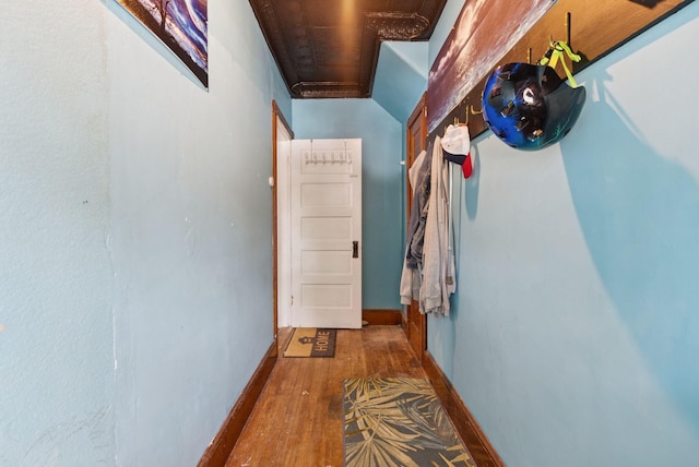 93 Chapel St, South Portland, ME 04106 - corridor featuring wood finished floors and baseboards