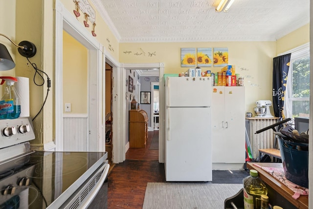 93 Chapel St, South Portland, ME 04106 - kitchen with freestanding refrigerator, electric range, crown molding, and wood finished floors
