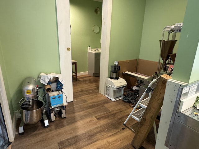 40 Elm St, Waterville, ME 04901 - miscellaneous room featuring wood finished floors and a sink